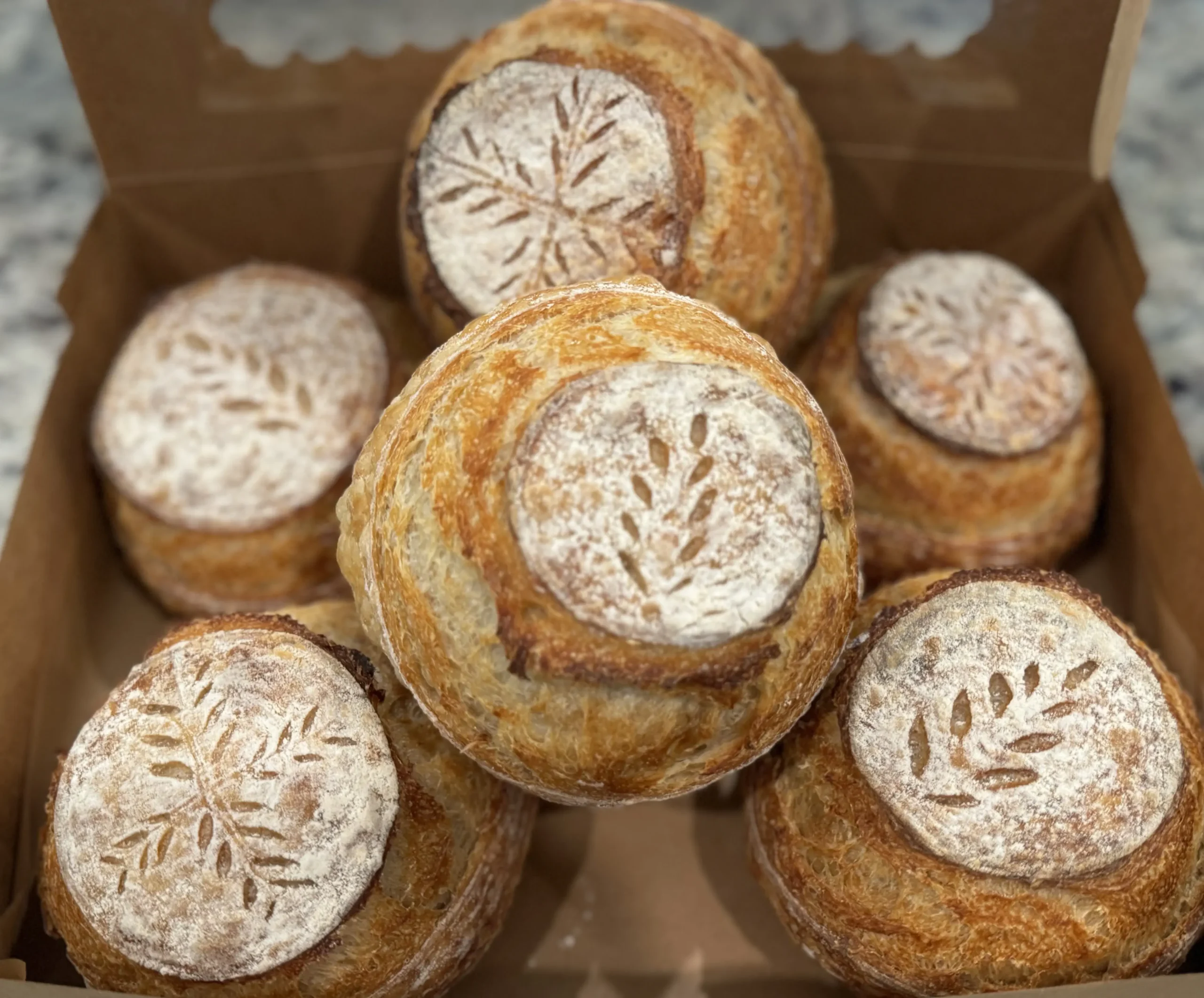 Hollowed sourdough bread bowls ready for soup